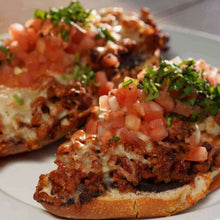 Load image into Gallery viewer, Molletes made with Mad Mexican House-Made Chorizo
